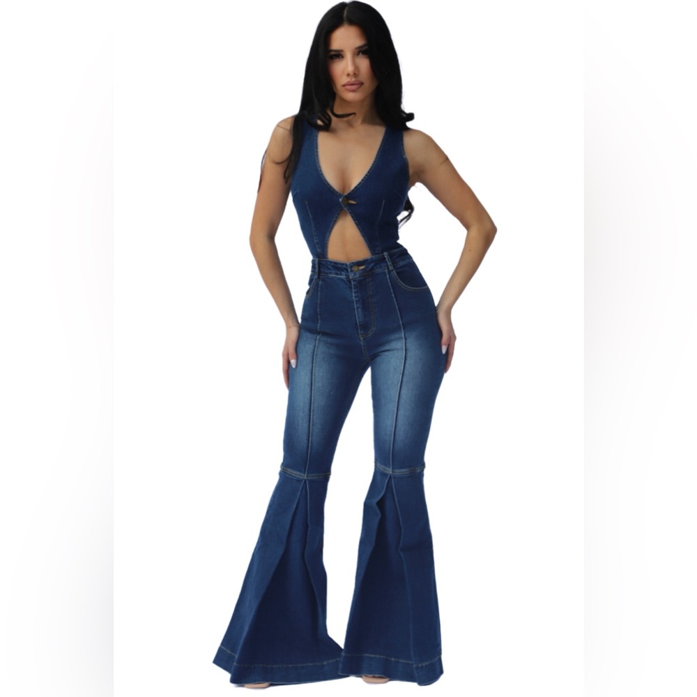 Denim jumpsuit with flare out bottoms.